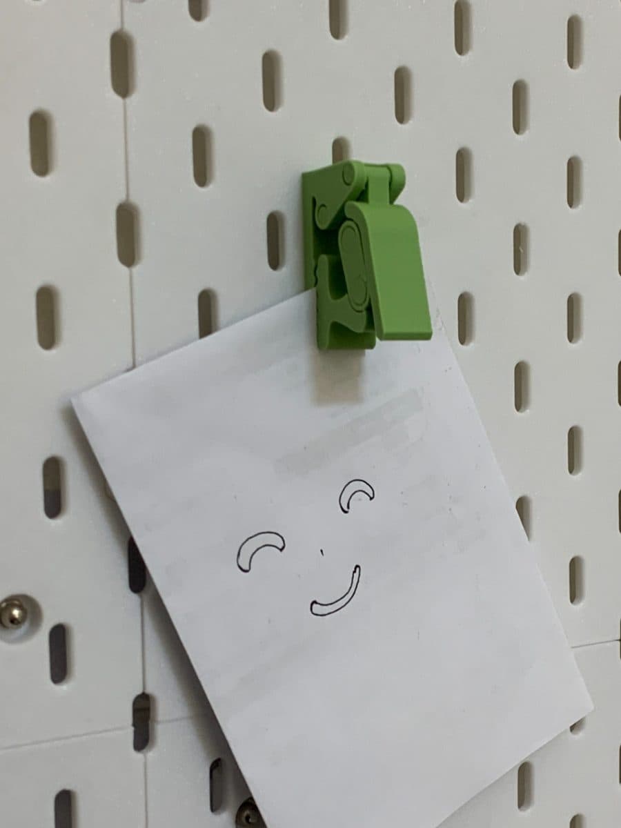 Quick-Release Photo Clip for Pegboard